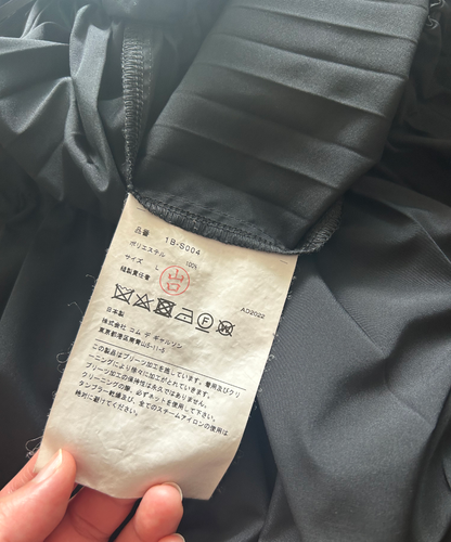 Black Comme des Garcons SS22 2-way asymmetrical pleated skirt