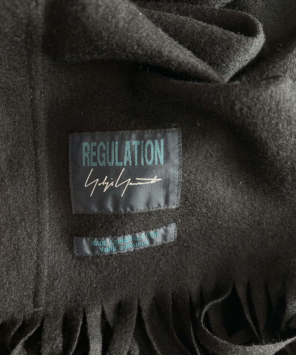 Regulation by Yohji Yamamoto Asymmetrical Fringe Cape